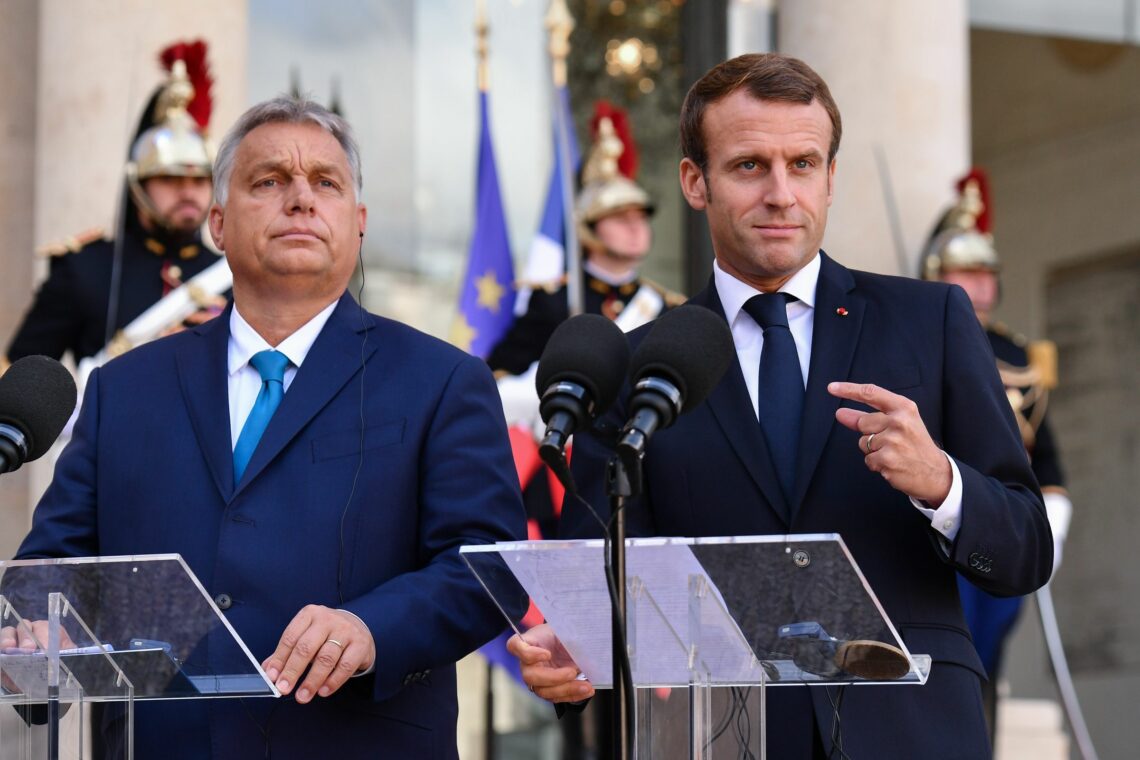 Hungarian Prime Minister Viktor Orban and French President Emmanuel Macron speak to the press in Paris on October 11, 2019.