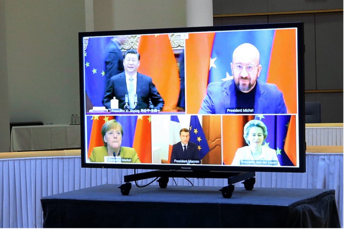 Picture of a large monitor in Brussels’ Europa Building showing China's President Xi Jinping, President of the European Council Charles Michel, German Chancellor Angela Merkel, French President Emmanuel Macron and Ursula von der Leyen, European Commission president, at a remotely conducted meeting.