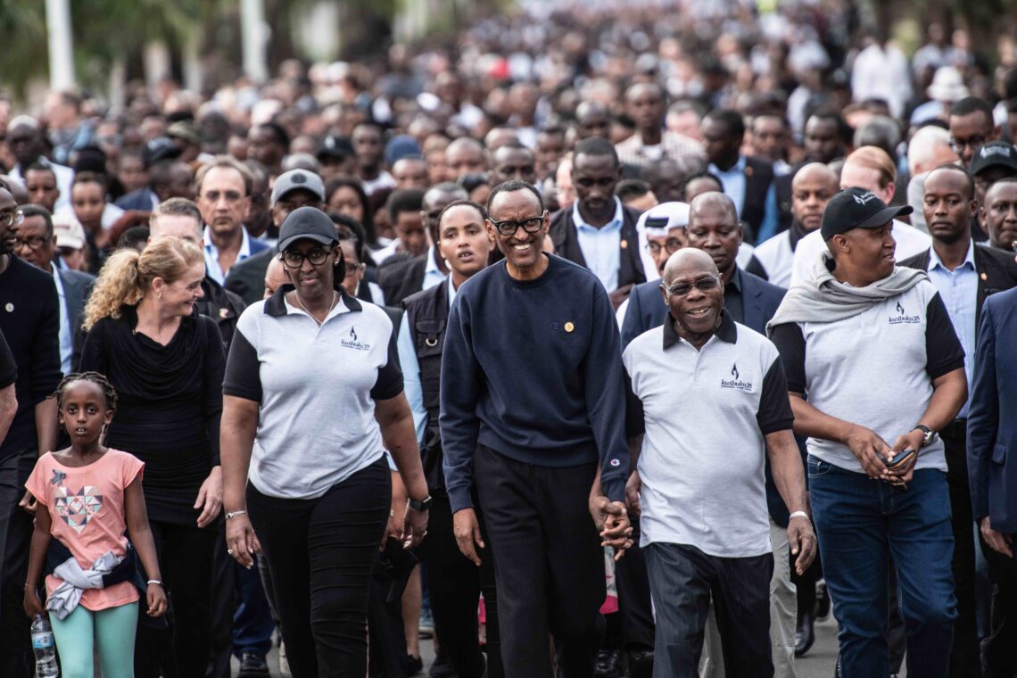 Rwandan President Paul Kagame leads a walk during commemoration services on April 07, 2019 in Kigali