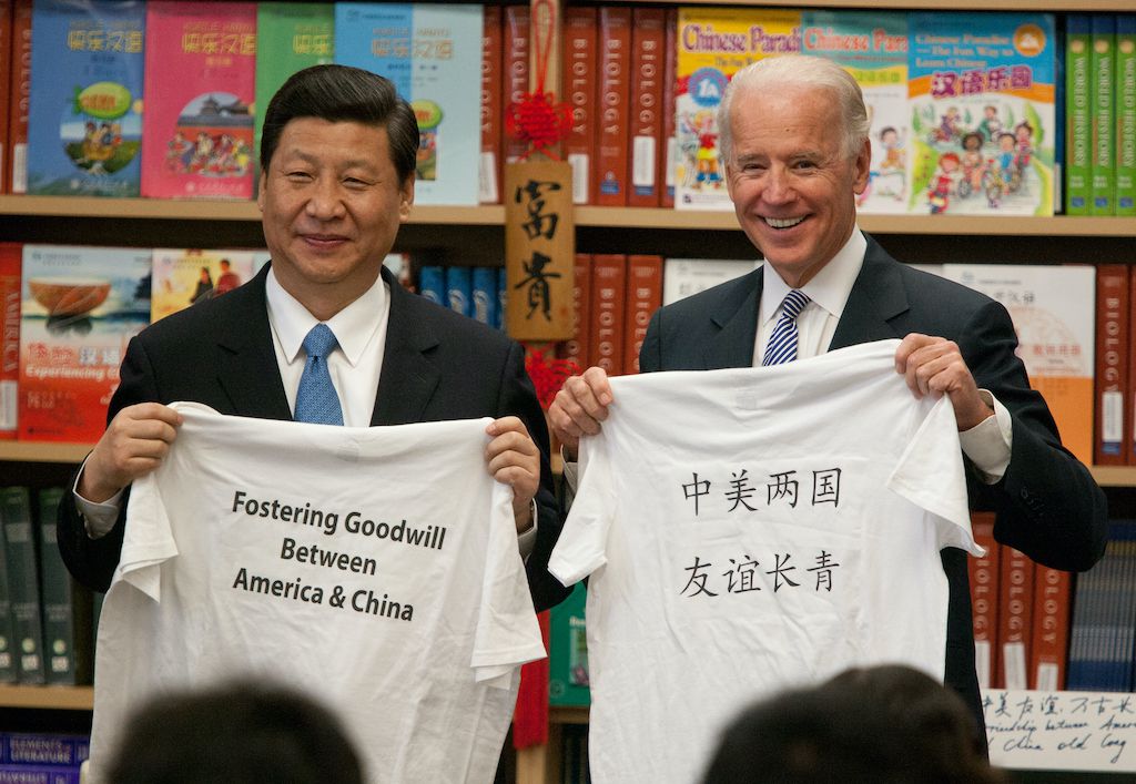 The newly-minted leader of China and vice president of the U.S. are holding T-shirts with a goodwill message in English and Chinese in 2012