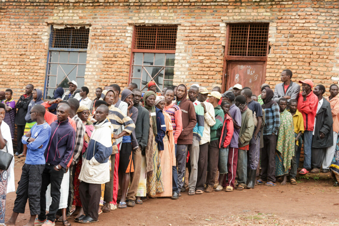 People stand in line to vote in a constitutional referendum in Ngozi Province, Burundi