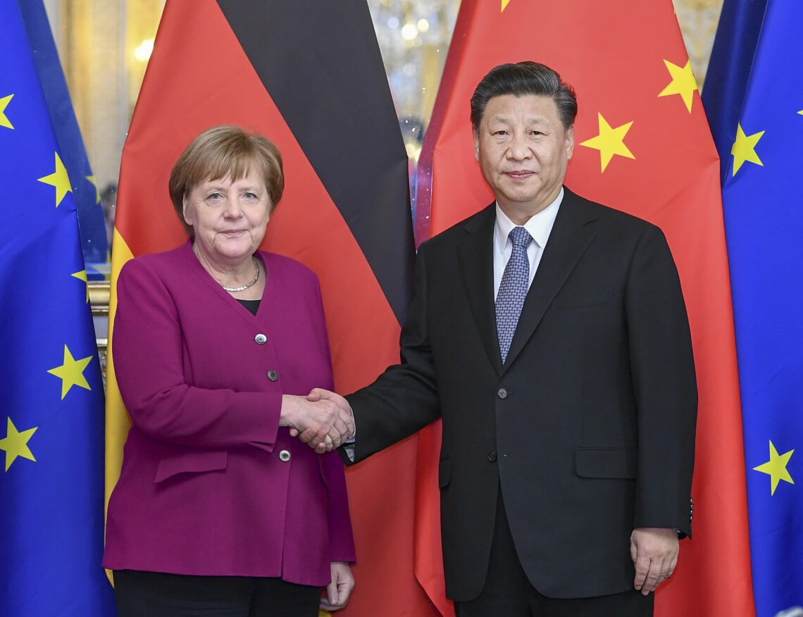 Chinese President Xi Jinping meets with German Chancellor Angela Merkel in Paris in March 2019