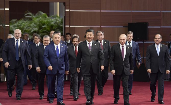 Chinese President Xi Jinping walks with foreign leaders at the Second Belt and Road Forum for International Cooperation in Beijing on April 26, 2019.