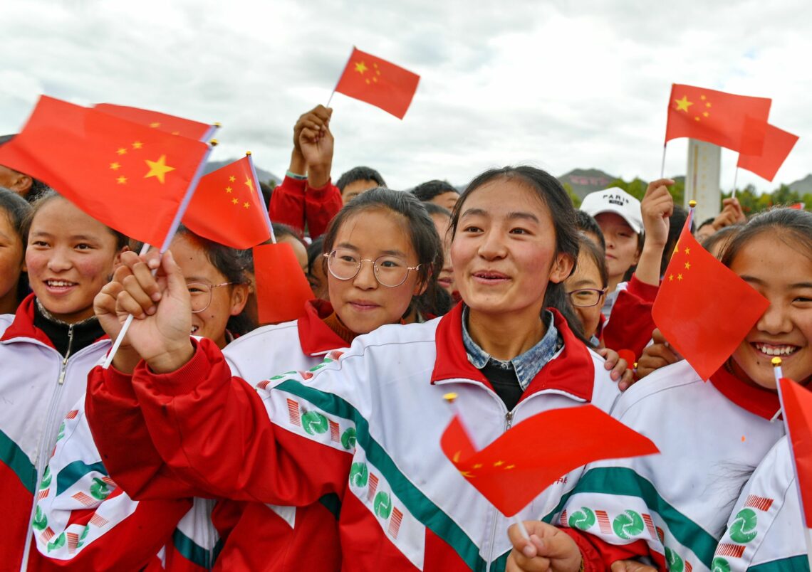 Teenagers celebrating the 70th anniversary of the People’s Republic of China