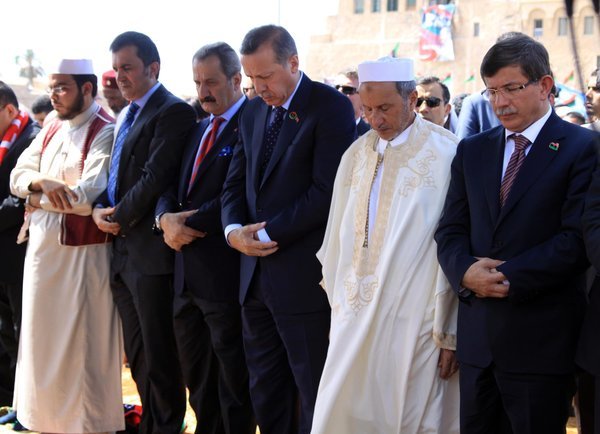 Turkish Prime Minister Recep Tayyip Erdogan and Libyan National Transitional Council Chairman Mustafa Abdel Jalil attend Friday prayers in Tripoli