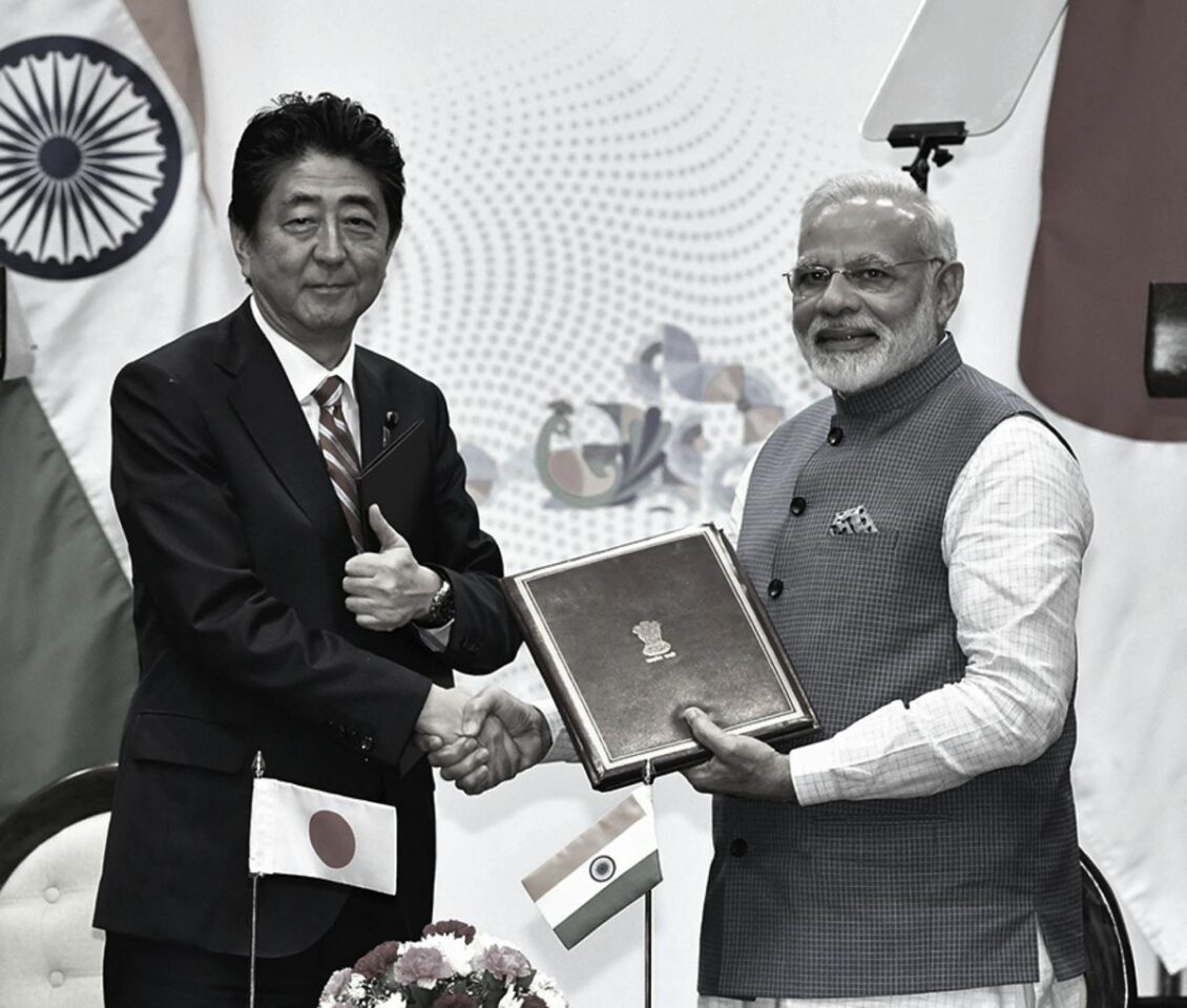 The prime ministers of Japan and India, Shinzo Abe and Narendra Modi, shake hands in 2017