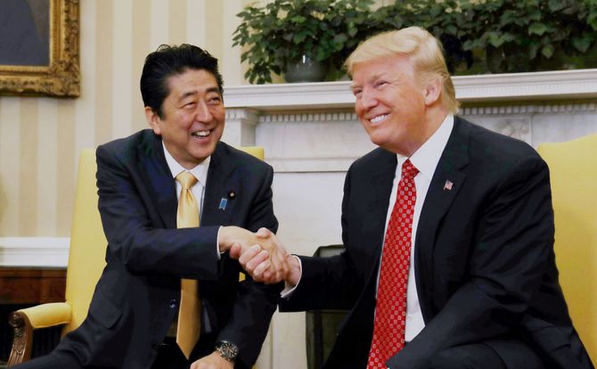 Japanese Prime Minister Shinzo Abe shakes hands with U.S. President Donald Trump during their summit at the White House in Washington, D.C., Feb. 10, 2017