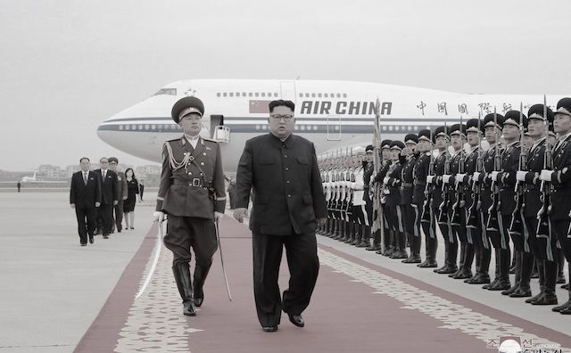 Kim Jong-un inspects the honor guard after returning home from his meeting with Donald Trump