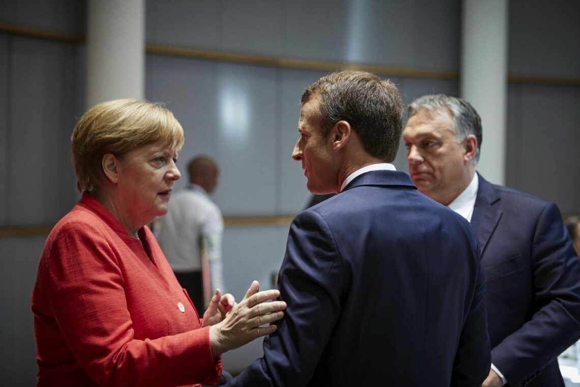 German Chancellor Merkel and French President Macron confer in Brussels, June 2018