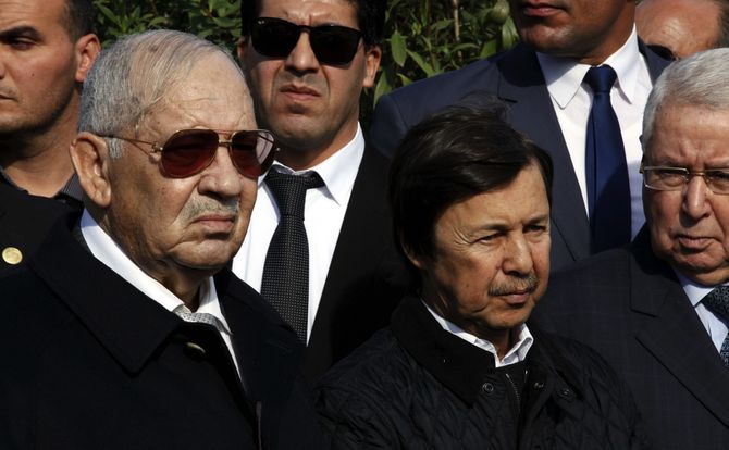 Said Bouteflika (C), the younger brother of Algerian President Abdelazziz Bouteflika