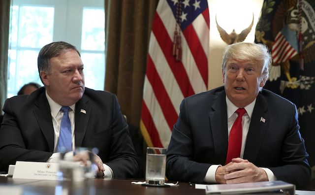A picture of U.S. President Donald Trump and Secretary of State Mike Pompeo at a cabinet meeting