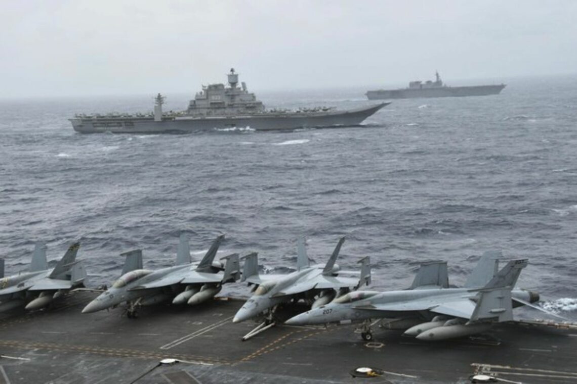 Japanese and Indian navy carriers seen from the flight deck of the supercarrier USS Nimitz