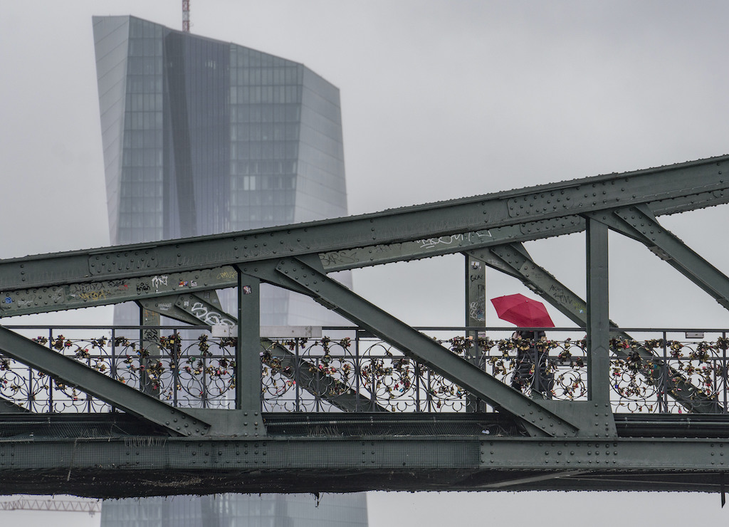 The ECB headquarters skyscraper seen from behind Frankfurt’s Iron Bridge