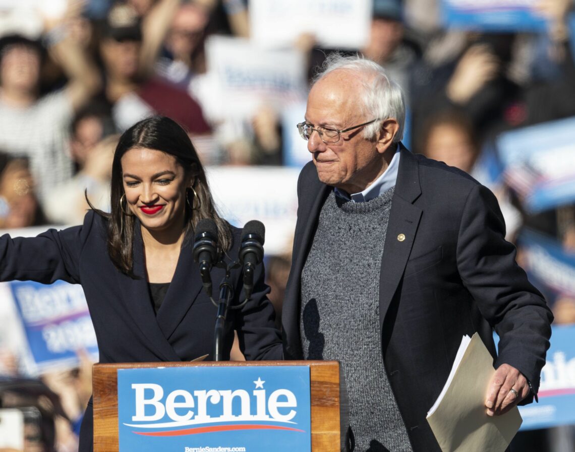 U.S. Representative Alexandria Ocasio-Cortez and presidential candidate Senator Bernie Sanders modern monetary theory