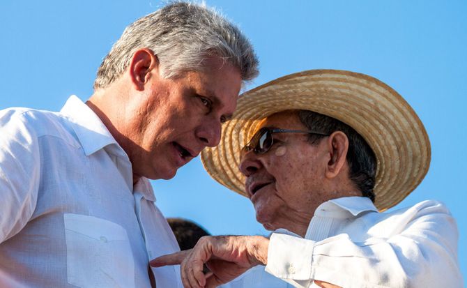 Cuban President Raul Castro speaks with First Vice President Miguel Diaz-Canel Cuba new leader