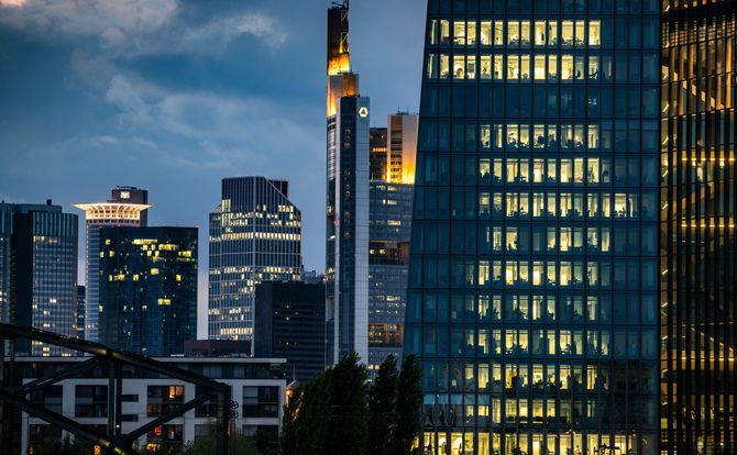 ECB headquarters against the skyline of downtown Frankfurt, Germany