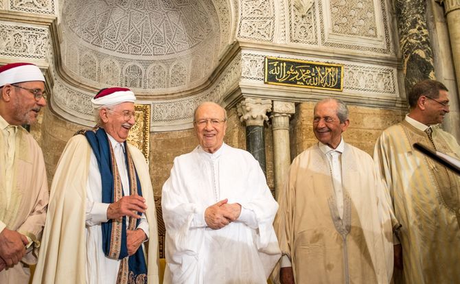 Tunisian President Beji Caid Essebsi (C) attends a reading of the Hadith at Al-Zaytuna Mosque in Tunis