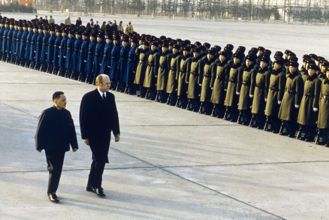 President Gerald Ford reviewing Chinese troops with Chinese Premier Deng Xiaoping in a 1975 visit