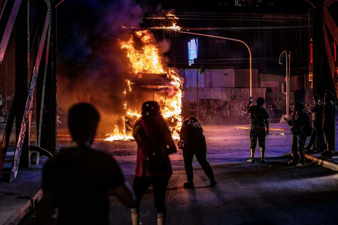 Bus burning during protests in Santiago, Chile
