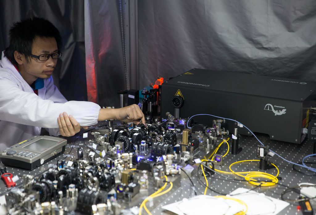A Chinese researcher in a quantum communication test lab