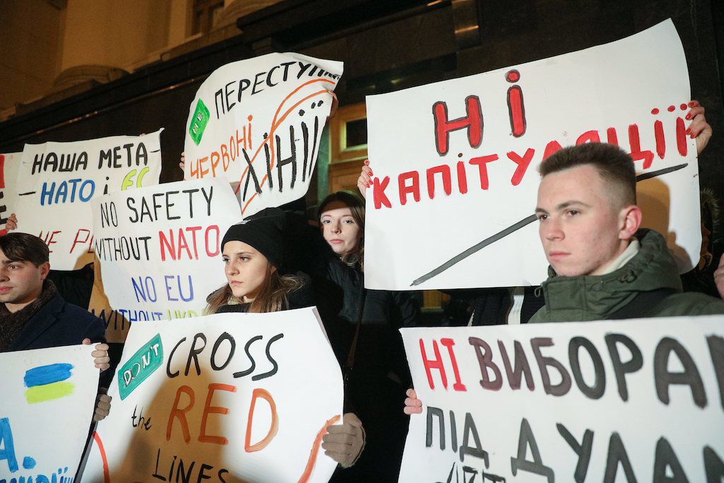 Ukrainians rally in front of the president’s palace in Kiev hours before the Normandy Four meeting on December 9, 2019