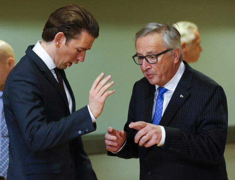 Austria’s Chancellor Sebastian Kurz and European Commission President Jean-Claude Junker talk at a Brussels meeting EU challenges