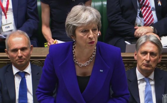 British Prime Minister Theresa May answering awkward questions about Brexit in parliament