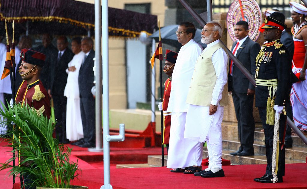 Indian Prime Minister Narendra Modi attends a welcome ceremony with Sri Lankan President Maithripala Sirisena in Colombo, Sri Lanka