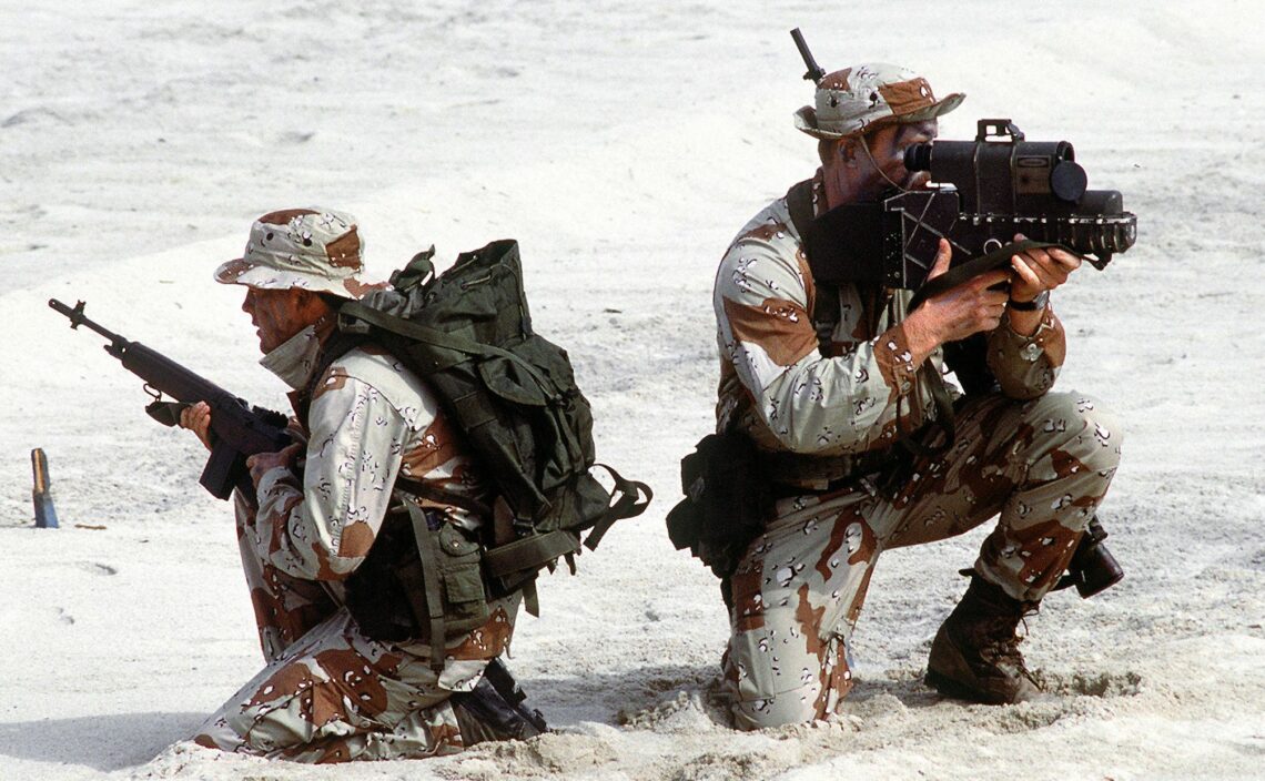 Two U.S. Navy SEALs participate in a training exercise