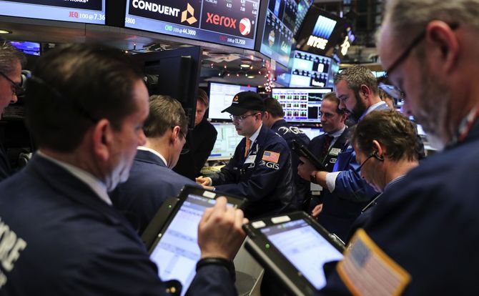 Traders on the floor of the New York Stock Exchange