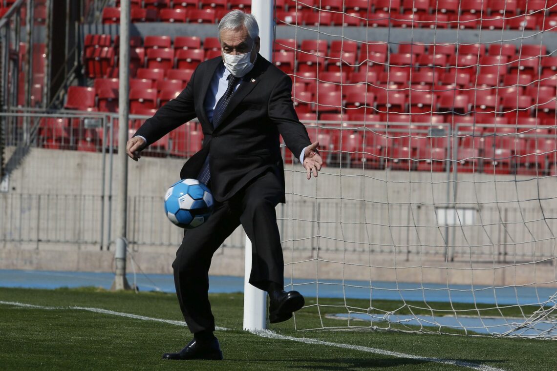 Chilean President Sebastian Pinera playing soccer