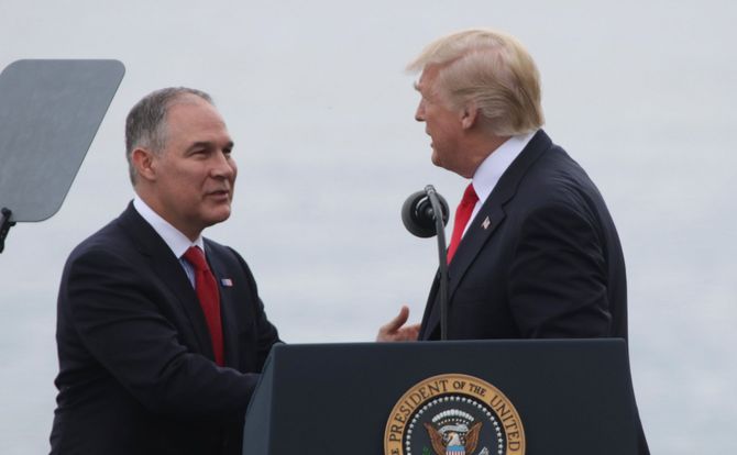 President Donald Trump shakes hands with Environmental Protection Agency administrator Scott Pruitt