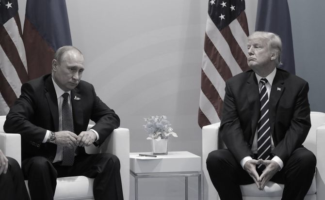 U.S. President Donald Trump (R) and Russian President Vladimir Putin meet at the G20 summit in Germany, in 2017
