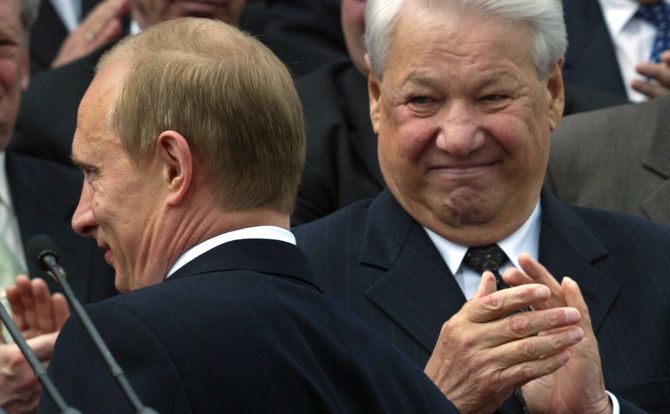 Russian President Vladimir Putin and his predecessor Boris Yeltsin celebrate Independence Day in 2003