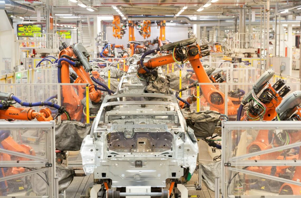 Industrial robots at an automotive assembly line