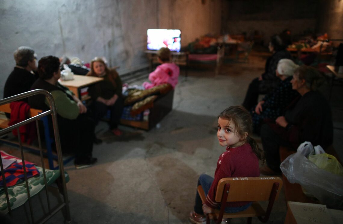 Refugees in a Nagorno-Karabakh bomb shelter