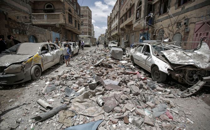 The aftermath of a Saudi-led coalition air strike in Sanaa, May 2019