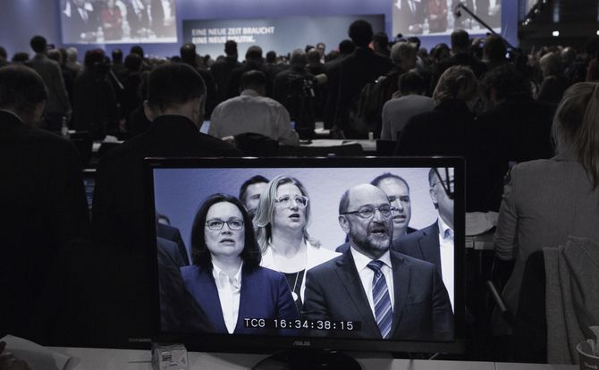 Former SPD leader Martin Schulz shown on video monitor at a party conference in Bonn