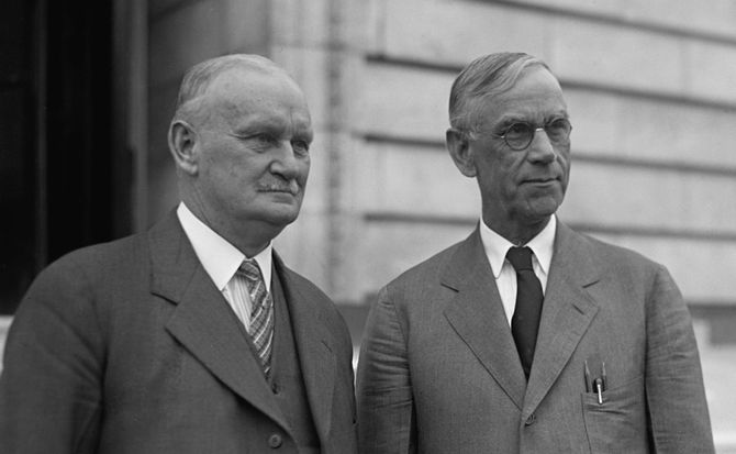 Willis C. Hawley (L) and Reed Smoot in April 1929, shortly before the Smoot-Hawley Tariff Act passed the House of Representatives