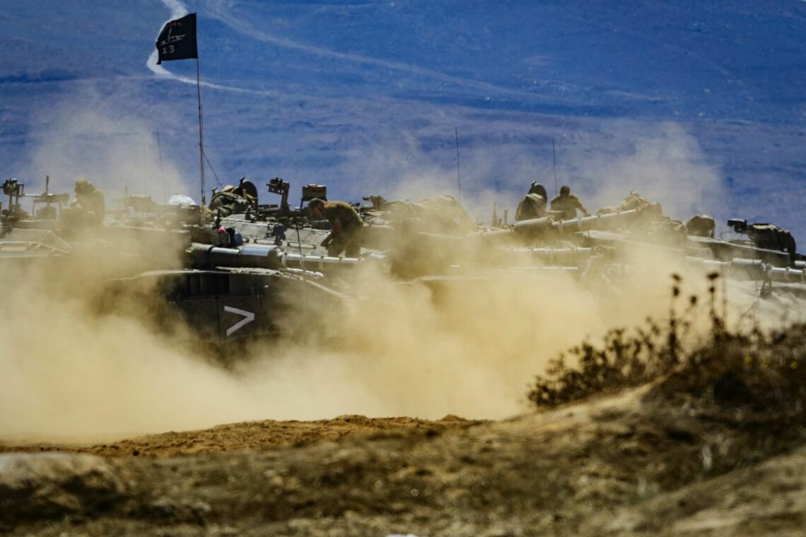 Israeli armored unit simulates an attack on Hezbollah units near the Golan Heights history Middle East