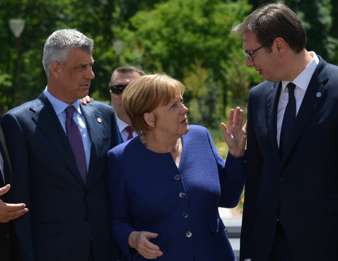 German Chancellor Angela Merkel is flanked by President of Kosovo Hashim Thaci (L) and Serbian President Aleksandar Vucic (R) at the 2018 EU-Western Balkans Summit