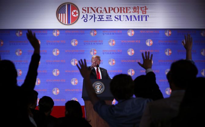 U.S. President Donald Trump answers questions in Singapore, ahead of his summit with North Korean leader Kim Jong-un