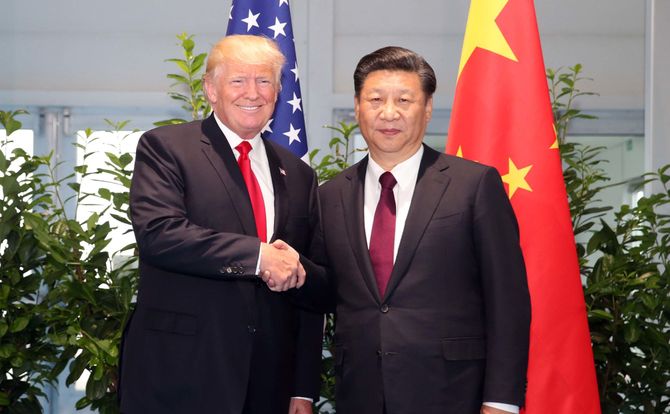 July 8, 2017: U.S. President Donald Trump and Chinese President Xi Jinping shake hands at the G20 summit in Hamburg, Germany
