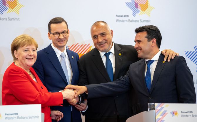 Officials from Germany, Poland, Bulgaria and North Macedonia shake hands at the Western Balkans Summit in Poznan, Poland in July 2019