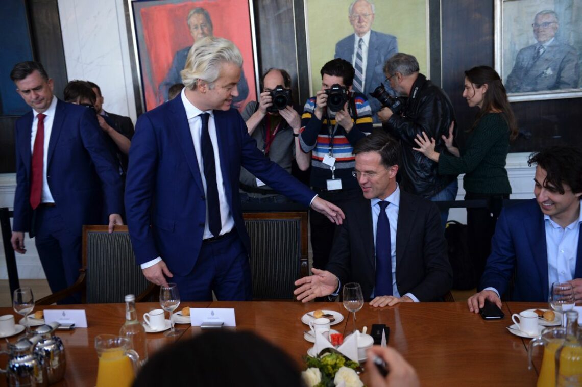 Dutch Prime Minister Mark Rutte (R) and his main challenger, populist Geert Wilders (L) populist wave Europe