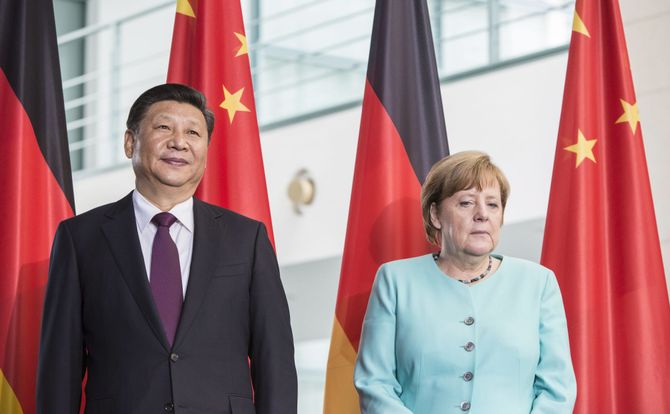 Chinese President Xi Jinping and German Chancellor Angela Merkel meet in Berlin