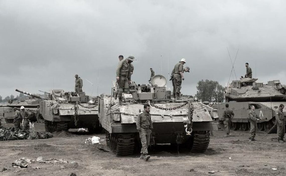 A picture showing Israeli armor positioned on the Israeli-annexed Golan Heights, near Israel’s border with Syria
