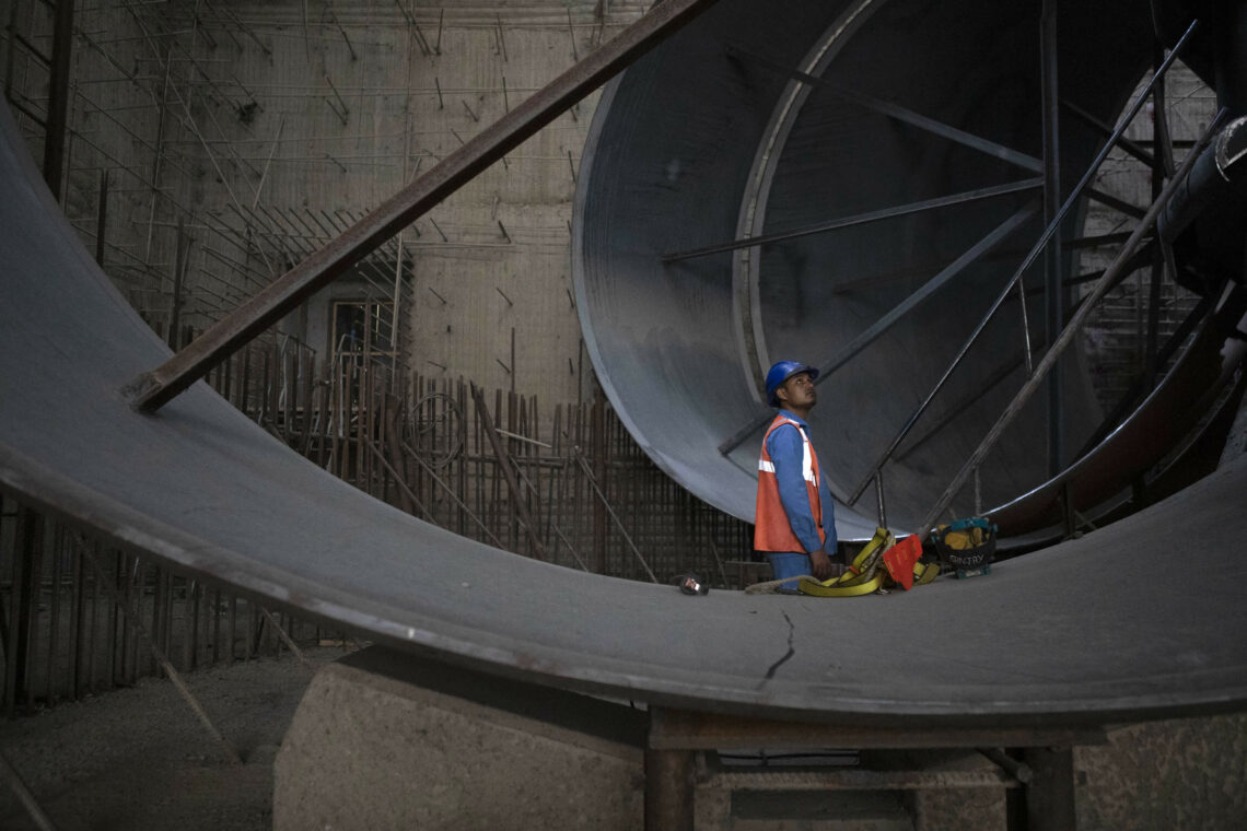 An employee in a GERD turbine room Grand Renaissance Dam