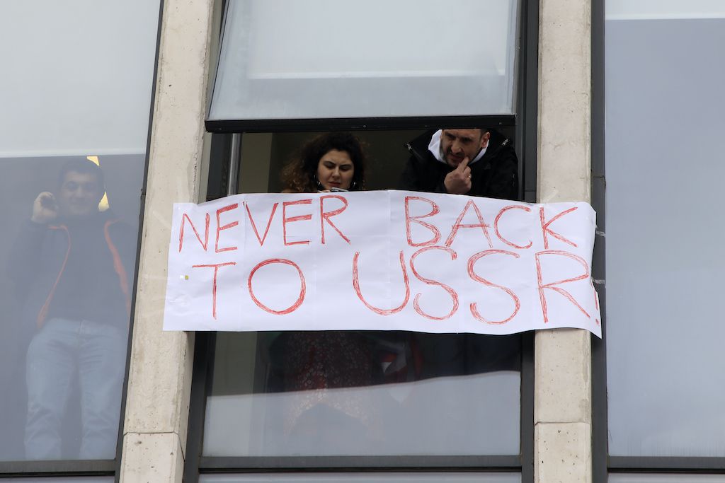 A banner reading "Never Back to USSR" hung on a political party office building in Georgia