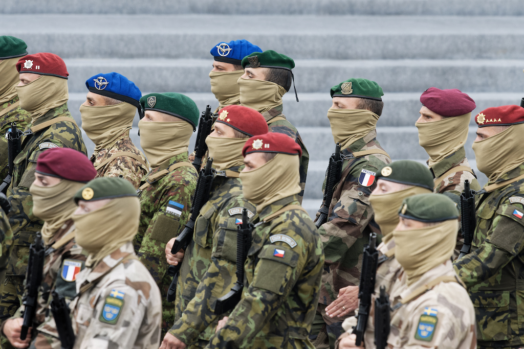 Troops from several European countries parading in Paris